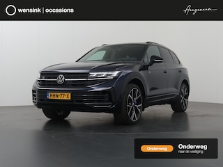 Volkswagen Touareg 3.0 TSi eHybrid 4MOTION R | HUD | Dyna Audio | Trekhaak | Nachtzicht | Stoelverwarming voor en achter | Panoramadak | Matrix LED | Luchtvering | Stoelmassage | Comfort-Pakket | SoftClose |