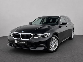 BMW 3-serie Touring 330e xDrive | Laser | Trekhaak | Head Up | 360 | Sfeerverlichting | Dodehoek | 1e eigenaar