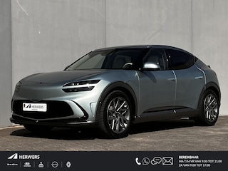 Genesis GV60 AWD 307 PK / Fabrieksgarantie tot 12-2027 / Accu SoH 95,5 % / Batterij 8 jaar / 1.600 kg afneembare trekhaak / WLTP 470 km / CCS snel laden / Leder / HUD / Camera 360° / Stoelventilatie / Stuur- & stoelverwarming / Ergo stoel / 20" LM wielen & All Season banden /