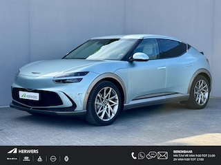 Genesis GV60 AWD 307 PK / Fabrieksgarantie tot 12-2027 / Accu SoH 95,5 % / Batterij 8 jaar / 1.600 kg afneembare trekhaak / WLTP 470 km / CCS snel laden / Leder / HUD / Camera 360° / Stoelventilatie / Stuur- & stoelverwarming / Ergo stoel / 20" LM wielen & All Season banden /