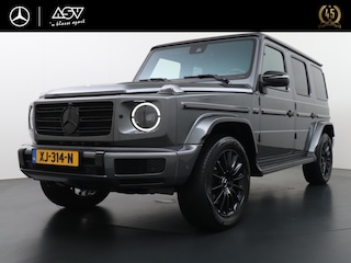 Mercedes-Benz G-klasse 500 AMG-Line | Schuif - Kanteldak | Trekhaak | Massage Stoelen | Sportuitlaat | 360° Camera | DAB+ Radio | Sfeerverlichting | Multibeam LED Koplampen