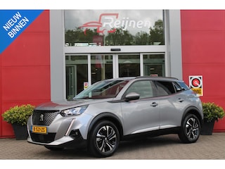 Peugeot 2008 1.2 100PK ALLURE PACK | AFNEEMBARE TREKHAAK | ACHTERUITRIJ CAMERA | NAVIGATIE | APPLE CARPLAY/ANDROID AUTO | CRUISE CONTROL | DAB+ RADIO | CLIMATE CONTROL | GETINTE RUITEN | ALL SEASON BANDEN |