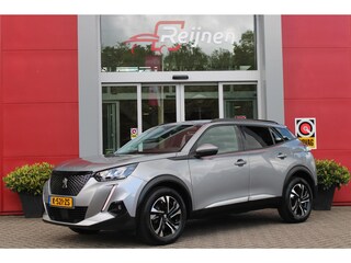 Peugeot 2008 1.2 100PK ALLURE PACK | AFNEEMBARE TREKHAAK | ACHTERUITRIJ CAMERA | NAVIGATIE | APPLE CARPLAY/ANDROID AUTO | CRUISE CONTROL | DAB+ RADIO | CLIMATE CONTROL | GETINTE RUITEN | ALL SEASON BANDEN |