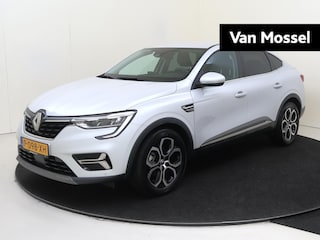 Renault Arkana 1.6 E-Tech Hybrid 145 Intens | Apple Carplay/Android Auto | Autonomous Emergency Braking | cruise control adaptief | dodehoek detectie | electronic climate control | lederen/stof bekleding | LED koplampen | lichtmetalen velgen 18" | navigatiesysteem |