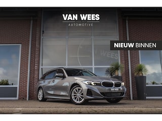 BMW 3-serie Touring 320e | 1e eigenaar | NL auto | Keyless entry | Sportstoelen | Memory | Apple carplay | HiFi audio | DAB | Parking Assistant | Cruise control | Stoelverwarming | Trekhaak