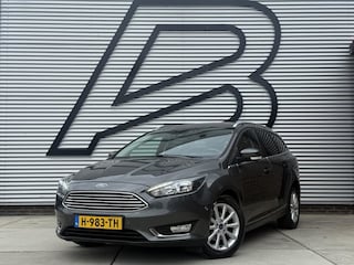 Ford Focus Wagon 1.0 Titanium 1e Eigenaar|Navi|Clima|Cruise|Carplay|Stoel+Stuur verw|PDC V+A|APK tot 12-2026
