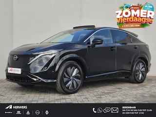 Nissan Ariya Evolve 66 kWh / SOH 99% / Glazen schuif- en kanteldak / CCS snelladen / warmtepomp / Stuur- Stoel & Achterbank verwarming / Head Up Display / Adaptief cruise control / Stoelventilatie / Bose Audio Systeem / Elektrische achterklep / Draadloze telefoon lader /