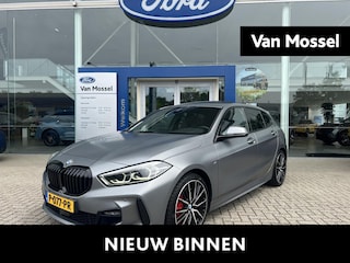 BMW 118i Executive | M-Sport | 19-Inch | BMW-Individual Frozen Grey | Panodak | Stoelverwarming | Camera | Cruise Control | Lederen Bekleding | Dealeronderhouden