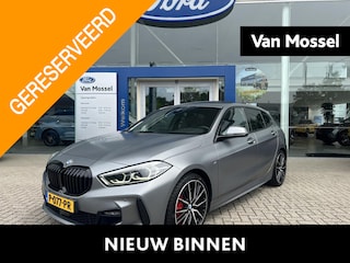 BMW 118i Executive | M-Sport | 19-Inch | BMW-Individual Frozen Grey | Panodak | Stoelverwarming | Camera | Cruise Control | Lederen Bekleding | Dealeronderhouden