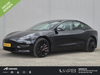 Tesla Model 3 Performance AWD 75 kWh / CCS snelladen / Stuur- Stoel & Achterbank verwarming / Panoramadak / Rondomzicht camera / Draadloze telefoon lader / Elektrische achterklep / Voorruit verwarming / Apple Carplay Android Auto / Lichtmetalen wielen 20“ /