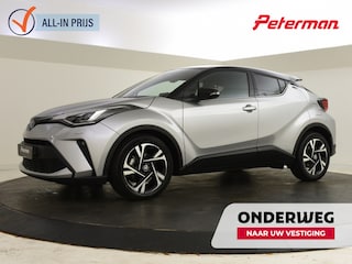 Toyota C-HR 1.8 Hybrid Bi Tone | lage km-stand | PDC | Navigatie | BLIS |