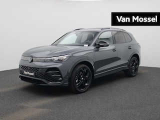Volkswagen Tiguan 1.5 eHybrid R-Line Edition 204 PK | Demo | Automaat| Black Style | Panoramisch- en Kantel dak | 360' Camera | Travel Assist | Draadloze Apple carplay | Navigatie | Keyless | Ruiten getint | Achterklep elektrisch | Ergo stoelen | Dodehoeksensoren | Stoelverwarming |
