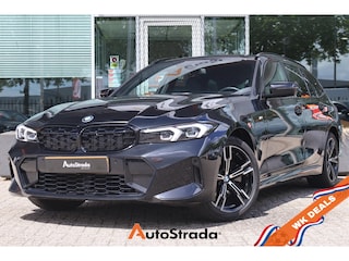 BMW 3-serie Touring (g21) 330e M-Sport 292pk | LED | Sfeer | Trekhaak | Camera | Stoelverwarming | Leder