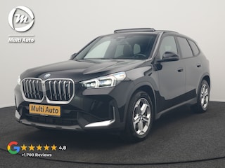BMW iX1 xDrive30 67 kWh 313pk Dealer O.H. | Trekhaak Af Fabriek | Panodak | Adaptive Cruise | Head Up | 360 Camera | Harman / Kardon | Adaptief Onderstel | Lederen Sportstoelen Massage & Verwarmd | Stuur Verwarmd | Hifi Audio | Keyless | Blis |