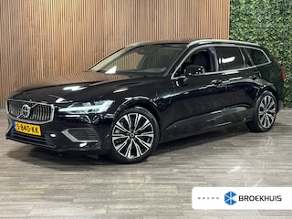 Volvo V60 T8 AWD Recharge Plus Bright | Schuifdak | Trekhaak | 455pk | Adaptieve Cruise Control | Stoelverwarming voor+achter | Stuurwielverwarming | Full LED Meesturende koplampen | Pilot Assist | BLIS Dode Hoek Detectie | Parkeercamera | Elektrische voorstoelen geheugen | Lederen bekleding | Zitting verlenging voorstoelen | 18 Inch | Google Infotainment | Keyless Drive | Parkeersensoren voor+achter | Privacy Glass | Elektrisch bedienbare achterklep | DAB Radio | Apple Carplay/Android Auto | Volvo On Call met mobiele App functie | Onyx Black Metallic |