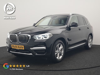 BMW X3 xDrive30e Business Edition Plus PHEV 293pk Dealer O.H. | Trekhaak Af Fabriek | Adaptive Cruise | 360 Camera | Adaptief Onderstel | Lederen Sportstoelen Memory & Ventilatie | Sfeerverlichting | Stoelen & Stuur Verwarmd | Keyless | Blis | Plug In Hybrid |