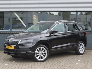 Skoda Karoq 1.5 TSI ACT Style DSG | sportstoelen | groot nav | voorruitverwarming | stoelverwarming | elektrische stoel + geheugen | camera | adaptive cruise