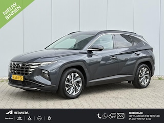 Hyundai Tucson 1.6 T-GDI MHEV Comfort Smart / Android Auto/Apple Carplay / Lederen Bekleding / Navigatie / Climate Control / Camera / Cruise Control / Draadloze Telefoonlader / Elektrische Stoel / Stoelverwarming / Lane Assist / Krell Audio / DAB /