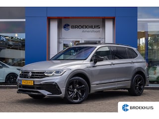 Volkswagen Tiguan 1.5 TSI R-Line Business+ 7p. | Trekhaak uitklapbaar elektrisch | Elektrisch panoramadak | adaptief Cruise control | Achteruitrijcamera | Apple Carplay/Android Auto | Aanhanger assistent | stoel/stuurverwarming | Aanhanger assistent | Achteruitrijcamera | Apple Carplay/Android Auto|telefoonintegratie premium