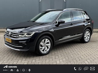 Volkswagen Tiguan 1.4 TSI eHybrid Elegance Business+ Dealer onderhouden / Elektrische trekhaak (1800 kg) / Accu SoH 94.4 % / Navigatie / Apple Carplay Android / Stuur- en stoelverwarming / Parkeer assistent / 18" LM wielen /