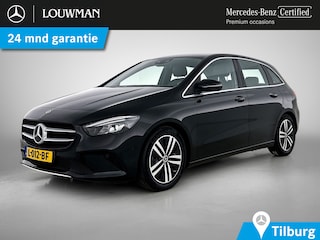 Mercedes-Benz B-klasse 180 Business Solution Luxury Trekhaak | Parkeerpakket met achteruitrijcamera | Ledkoplampen | Sfeerverlichting | Stoelverwarming. Inclusief 24 maanden MB Certified garantie voor Europa.