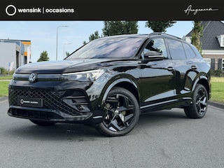 Volkswagen Tiguan 1.5 eHybrid R-Line | Trekhaak | IQ LED | Sportstoelen | Massage | Apple CarPlay/Android Auto | 360 Camera | Black Pack | HUD | 5 Jaar garantie* | Discover Pro Max | Winterpack | DAB | Adaptieve Cruise Control |