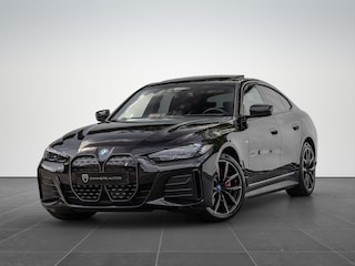 BMW i4 eDrive40 High Executive 84 kWh M-Pakket M-sportstoelen Schuif/kantel HuD
