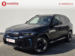BMW iX3 High Executive M-Sport 80 kWh SOH 100% 'Carbon-schwarz' Trekhaak Panoramdak Harman/Kardon | Adaptive Cruise Control | Elek. Stoelen | Head-Up | DAB