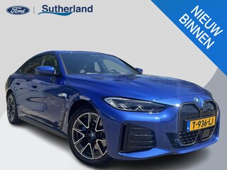 BMW i4 eDrive40 High Executive 84 kWh 340pk | M Sport pakket | Open Dak | Elektrische Achterklep | Adaptieve Cruise | All Season banden