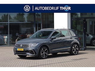 Volkswagen Tiguan 1.5 TSI R-Line Business+ 150PK / 110kW DSG, NL auto, 1e eigenaar nieuw door ons geleverd en onderhouden, wegklapbare trekhaak, R-Line in- en exterieur, keyless go & entry, panoramadak, 20" 'Suzuka' LMV, Apple Carplay & Android Auto, achteruitrijcamera, winterpakket (verwarmbare voorstoelen, verwarmbaar stuurwiel), assistentiepakket (dodehoeksensor (side assist)), LED Matrix (IQ.Lights), elektrische achterklep (easy open), elektrisch verstel-, verwarm- en inklapbare buitenspiegels (spiegelpakket), adaptieve cruise control (acc), digital cockpit pro, DAB+, spraakbediening, draadloze telefoonoplader, navigatie, parkeerassistent (park assist) etc.