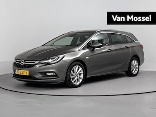 Opel Astra Sports Tourer 1.6 Innovation Airco | Bluetooth | Cruise Control | Electronic Climate Controle | Lederen Stuurwiel | Lichtmetalen Velgen | Parkeersensoren | Stuurwiel Multifunctioneel | Achteruitrijcamera | Comfortstoelen | Stof/Lederen Bekleding