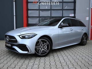 Mercedes-Benz C-klasse Estate 300 e AMG Line 313PK | Pano | Luchtvering | Air-Balance | MBUX | Burmester | Night Pakket | Ambient+ | Laser Led | Massage | Stoelventilatie & Verwarming | Stuurwielverwarming | Head-Up | Trekhaak | Cruise | Camera | Keyless