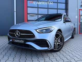 Mercedes-Benz C-klasse Estate 300 e AMG Line 313PK | Pano | Luchtvering | Air-Balance | MBUX | Burmester | Night Pakket | Ambient+ | Laser Led | Massage | Stoelventilatie & Verwarming | Stuurwielverwarming | Head-Up | Trekhaak | Cruise | Camera | Keyless