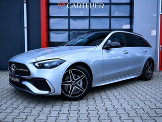 Mercedes-Benz C-klasse Estate 300 e AMG Line 313PK | Pano | Luchtvering | Air-Balance | MBUX | Burmester | Night Pakket | Ambient+ | Laser Led | Massage | Stoelventilatie & Verwarming | Stuurwielverwarming | Head-Up | Trekhaak | Cruise | Camera | Keyless