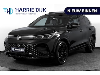 Volkswagen Tiguan 1.5 eHybrid R-Line Edition 272 PK | Black Style | 15 inch Navi | Elek. Trekhaak | IQ Light | S/K-Panodak | Dig. Cockpit | Adapt. Cruise | Stoel-+Stuurverw. | 360 Camera | NAV + App. Connect | ECC | Elek. Klep | LM 20" | 3819