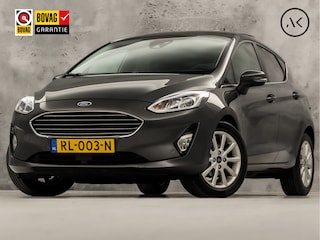 Ford Fiesta 1.0 EcoBoost Titanium (APPLE CARPLAY, GROOT NAVI, BANG&OLUFSEN, STUUR/STOELVERWARMING, CAMERA, SPORTSTOELEN, ADAPTIVE CRUISE, LM VELGEN, NIEUWSTAAT)