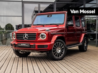 Mercedes-Benz G-klasse 500 | AMG LINE | 20 INCH MULTISPAAK | BURMESTER | RIJ-ASSISTENTIE PAKKET | SCHUIF-KANTELDAK | STOELVENTILATIE | ORIGINELE KLEUR HYACINTROOD | GRIJZE WRAP |