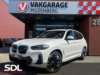 BMW iX3 High Executive Edition 80 kWh 99%SOH!! // LASER LED // ELEK.STOEL + MEMORY SEATS // SCHUIF-KANTELDAK // CAMERA // HARMAN KARDON AUDIO // ELEK. KLEP // CARPLAY + NAVI //