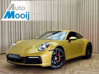 Porsche 992 911 3.0 Carrera S / 450 PK / Paint to Sample / PTS Yellow Storm / BOSE / Race-Tex / Alcantara / ACC / Sportuitlaat