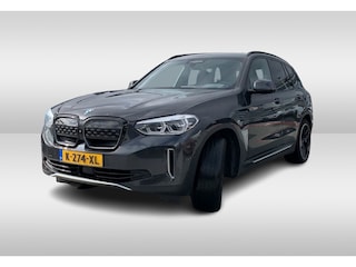 BMW iX3 High Executive 80 kWh / Panoramadak / Camera / Head-up / 20'' / Leder / Harman Kardon / Navigatie / Memory seats / Dodehoek / DAB / Stoelverwarming / Cruise Control Adaptief