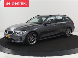 BMW 320i Executive Edition | Sport Line | Trekhaak | Harman/Kardon | Sfeerverlichting | Carplay | Half leder | Live Cockpit | Parkeerhulp | Navigatie | Climate control | Full LED | Bluetooth | Cruise control