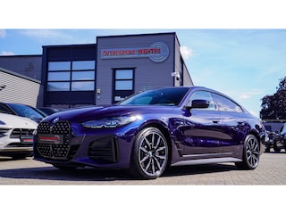 BMW 430i High Executive | Tanzanit Blau | Schuif/kanteldak | Harman/Kardon | Dealer onderhouden | Luxe Leder |