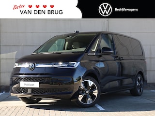 Volkswagen Multivan Bulli Edition L2 1.5 eHybrid EU6 180 kW 245pk | 2 Persoons bed | 7 Zits | Navigatie | Trekhaak | Panorama dak | 19 inch Lm velgen | ACC | Apple Carplay | Elek. bedienb. Schuifdeuren en achterklep | IQ Light |