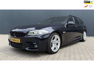 BMW 5-serie Touring 528i High Executive M Sport Airco Cruise Pano Luchtvering