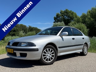 Mitsubishi Carisma 1.6 Comfort Drive | 1e Eigenaar | slechts 99.576 km | Airco | 15" Velgen | Nieuwe APK | Goed Onderhouden! |
