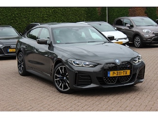 BMW i4 M50 High Executive 84 kWh / 360Camera / Head-up / Leder / Harman Kardon / Carbon intr.+extr. / 19'' / CarPlay / Stoelverwarming / Dodehoek / DAB / Cruise Control Adaptief