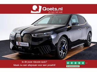 BMW iX xDrive50 High Executive 112 kWh Sportpakket - Panoramadak - Driving/Parking Assistant Professional - Multifunctionele stoelen - Stoelventilatie - Harman kardon - Comfort Access - BMW Laserlight -