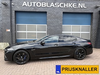 BMW M8 Competition, all black.