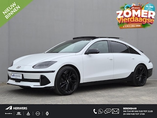 Hyundai Ioniq 6 First Edition AWD 77.4 kWh / SOH 100% / Dealer onderhouden / Fabrieksgarantie tot 02-2028 / CCS snelladen / warmtepomp / Stuur- Stoel & Achterbank verwarming / Glazen schuif- en kanteldak / WLTP bereik 519 km bereik stad 658 km / Head Up Display / Rondomzicht camera /