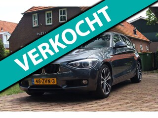 BMW 118i Upgrade Edition Aut. | Xenon | Lederen Stoelen | Airco | Navigatie | 17 Inch | Historie | Cruise control |